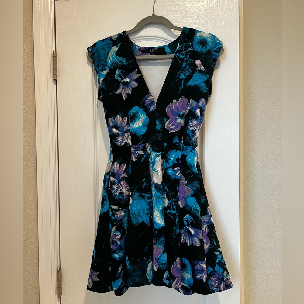 Gorgeous guess peplum dress with a love cut front